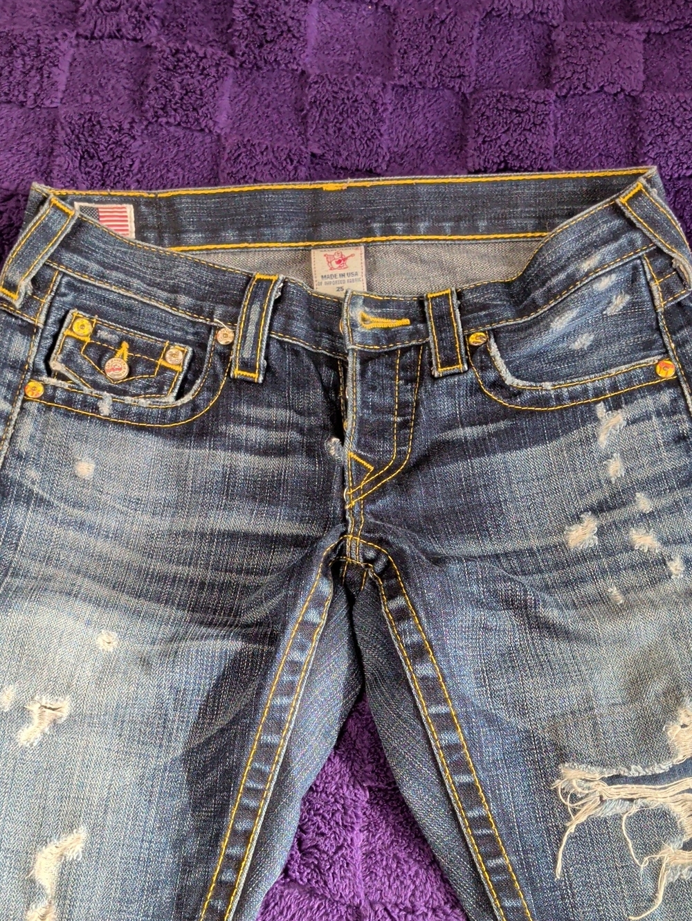 Women’s Distressed Blue Denim Jeans with Yellow Stitching